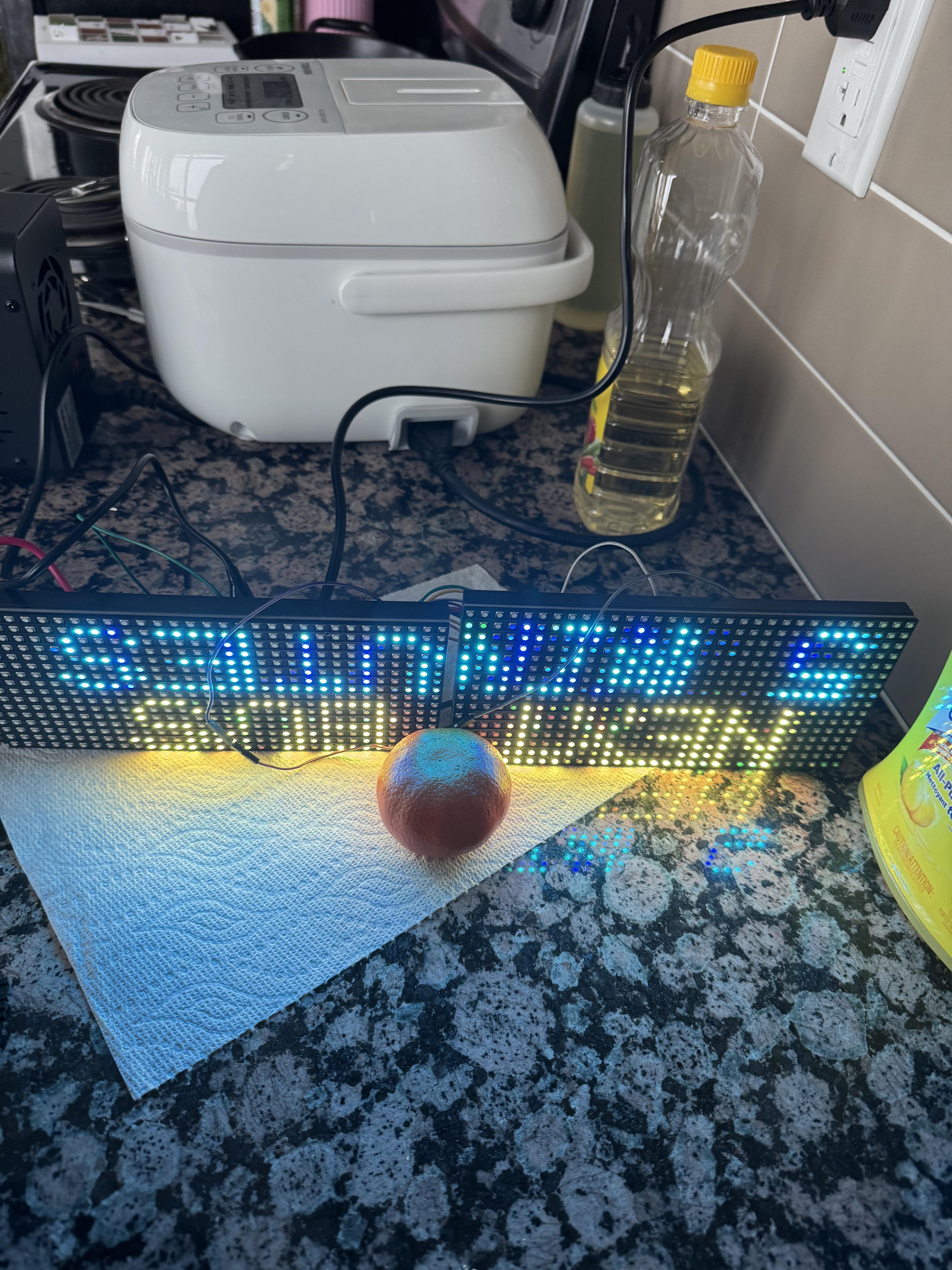 LED display on kitchen countertop with orange